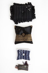 image of decorative pincushions arranged for exhibition