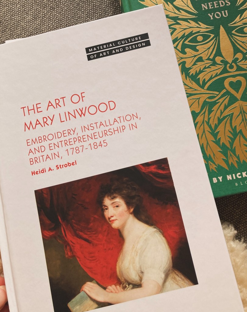 Photograph of the cover of Heidi A Strobel's book THE ART OF MARY LINWOOD. embroidery, installation and entrepreneurship in Britain 1787-1845